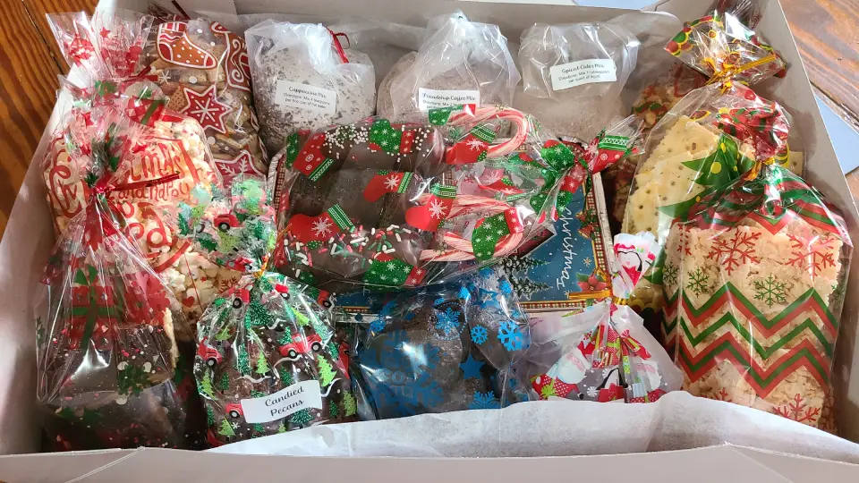 Christmas Box full of homemade sweet treats, salty snacks, and drink mixes.